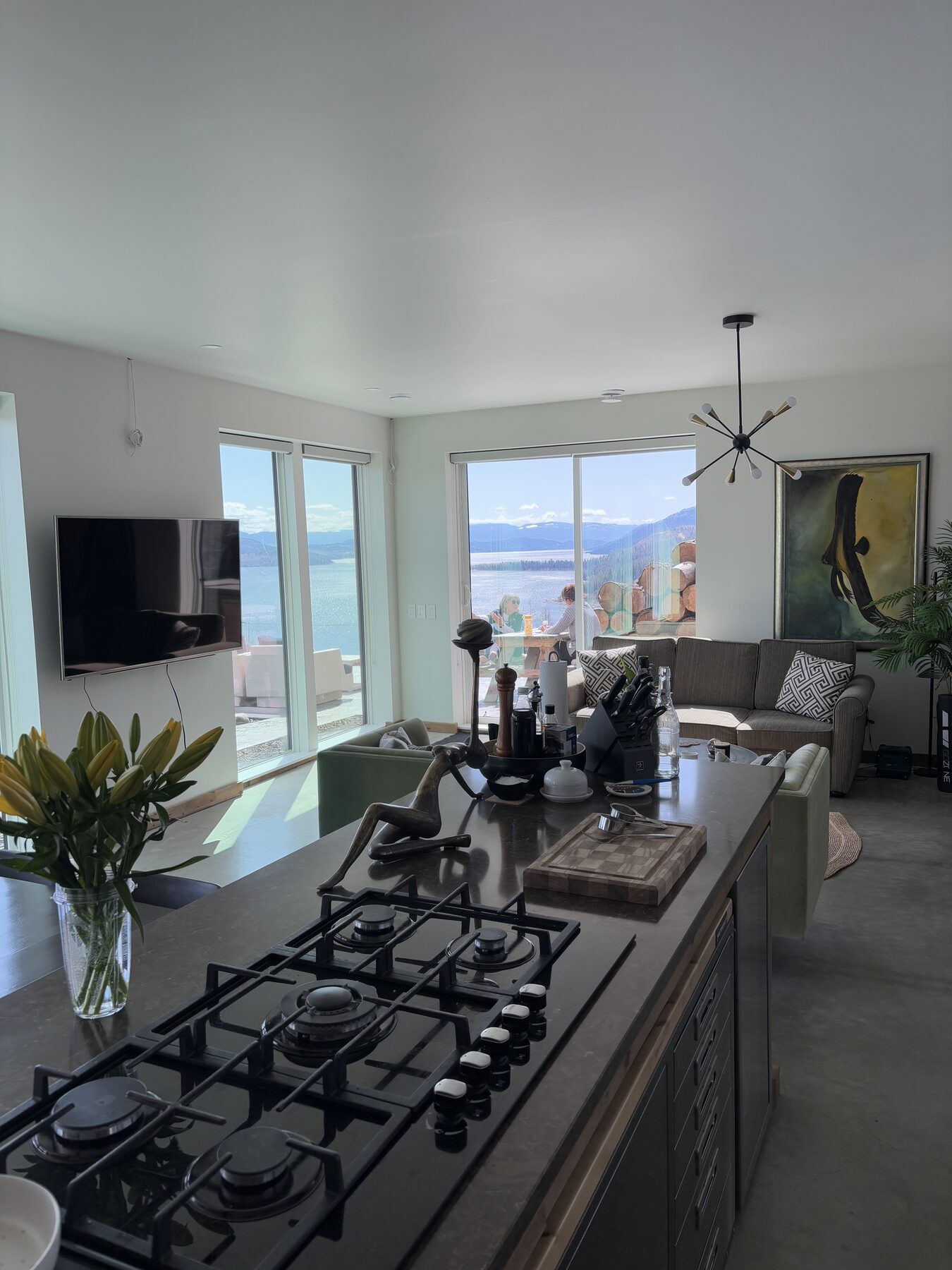 Kitchen island with lake views through the glass