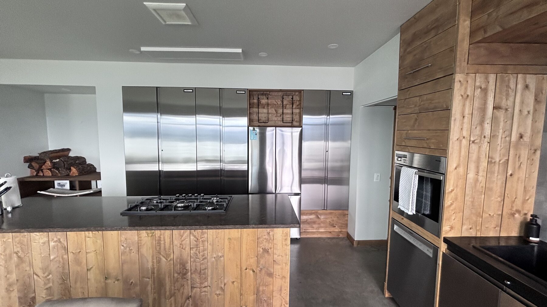 Kitchen with stainless cabinetry and gas cooktop